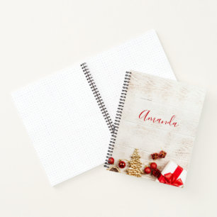 Cuaderno Temas de navidades en una pizarra de madera rústic