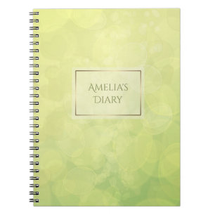 Cuaderno Textura abstracta de la cal del verde del bokeh.