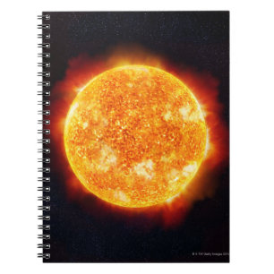 Cuaderno The Sun que muestra llamaradas solares contra una