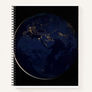 Cuaderno Tierra completa con luces de la ciudad