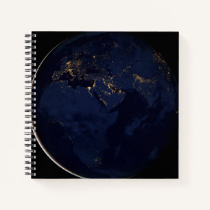 Cuaderno Tierra completa con luces de la ciudad