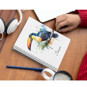 Cuaderno tocan colorido sentado en una rama