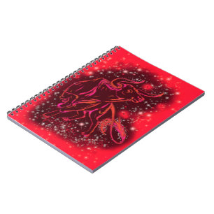 Cuaderno Toro de bloc de notas rojo corriendo en la noche e