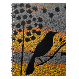 Cuaderno Un bloc de notas en espiral de pájaro entre plumas