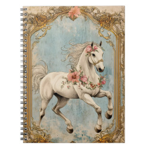 Cuaderno Un caballo blanco adornado con una guirnalda de fl