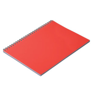 Cuaderno un fondo rojo con un borde blanco