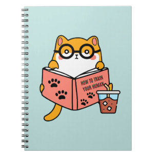 Cuaderno Un gato kawaii lindo leyendo un libro