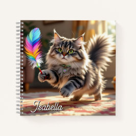 Cuaderno Un gato suave y suave persiguiendo a una pluma