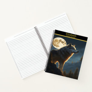 Cuaderno Un lobo majestuoso aullando bajo la luna llena en