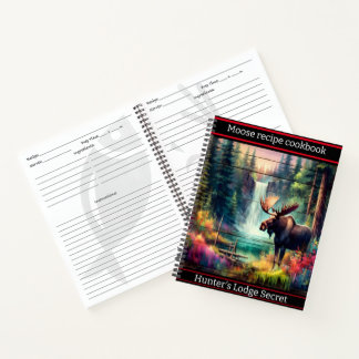 Cuaderno Un majestuoso alce con una vibrante cascada al ata