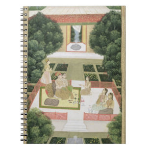 Cuaderno Un par en un jardín que escucha la música con