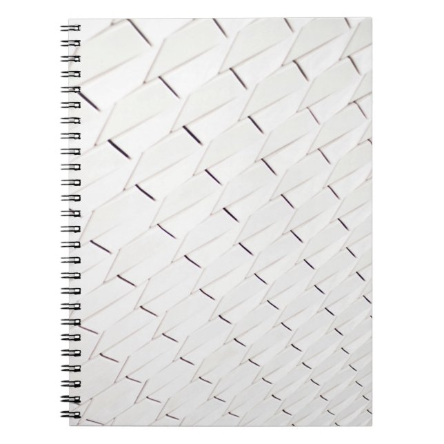 Cuaderno Un patrón de formas geométricas blancas en una fac (Frente)
