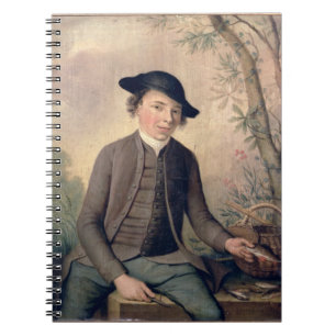 Cuaderno Un pescado de destripamiento del hombre joven,