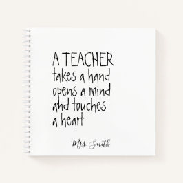 Cuaderno Un profesor toma la mano