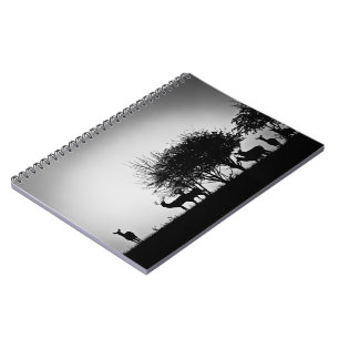 Cuaderno Una imagen de algunos ciervos en la niebla de la