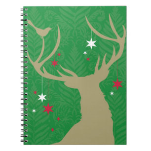Cuaderno Una silueta de un ciervo con las estrellas que