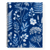Cuaderno universitario de reglas con flores botáni