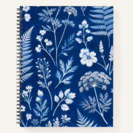 Cuaderno universitario de reglas con flores botáni