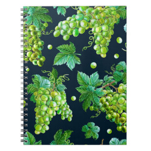 Cuaderno Uva verde acuarela, hojas sobre fondo oscuro.