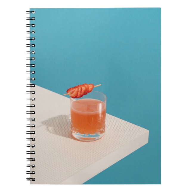 Cuaderno Vidrio transparente con líquido marrón (Frente)