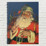 Cuaderno Vintage Christmas, Jolly Santa Claus con juguetes<br><div class="desc">Ilustracion de época Feliz Navidad diseño con un feliz y alegre Santa Claus con una larga barba blanca y un gorra cargando un saco lleno de juguetes en la Noche de los Navidades.</div>