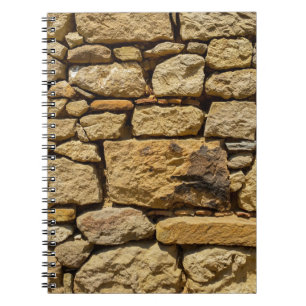 Cuaderno Vista de una pared antigua con abstracto de piedra