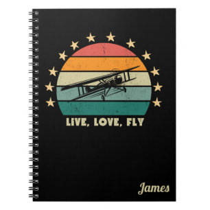 Cuaderno "Vive Ama Vuela" Texto, Avión Antiguo Puesta de So