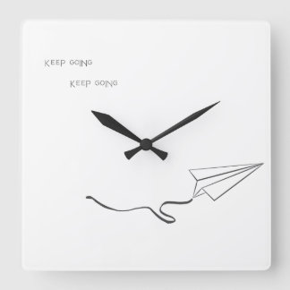 Cuadrado reloj de avión de papel