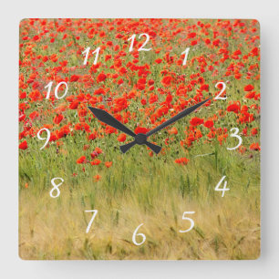 Cuadrado reloj de flores rojo de verano