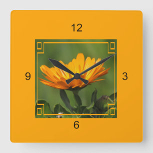 Cuadrado Reloj - Flor Naranja en el marco