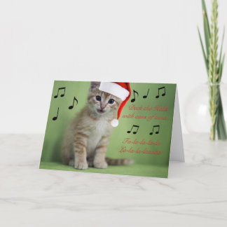 Cubierta la tarjeta de Navidad del gatito de los