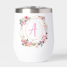 Cubo de vino geométrico dorado con flores rosadas