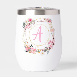 Cubo de vino geométrico dorado con flores rosadas