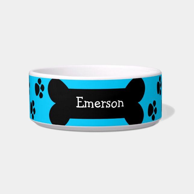 Cuenco azul del perro con las patas y el hueso (Frente)