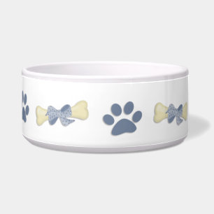 Cuenco azul del perro de las patas de los huesos
