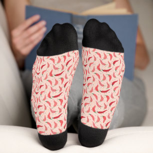 Cuidados pimientos chilenos en calcetines rosas