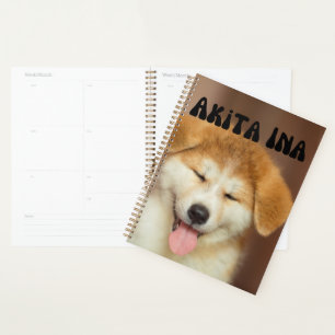 Cute Akita en un planificador de calendario de cac