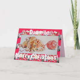 Cute Ginger Tabby Cat Jugando la tarjeta de Navida