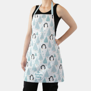 Cute pingüino de invierno delantal azul de Navidad