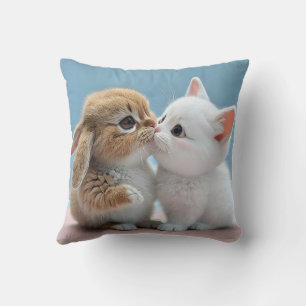 Cuto gato y cojín de almohada de conejo