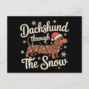 Dachshund a través de la nieve luces de Navidad pa