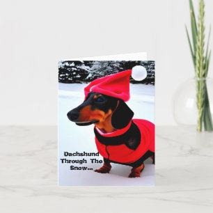 Dachshund A Través De La Nieve. Tarjeta de navidad