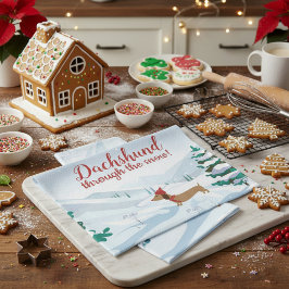 Dachshund a través de la toalla de mano de los Nav