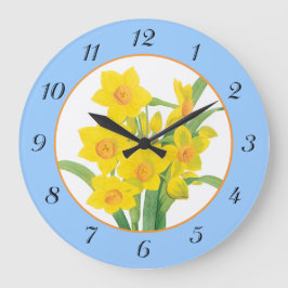 Dafóditos amarillos en el reloj de la pared floral