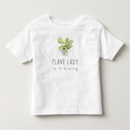 Dama de planta entrenando camiseta de niños