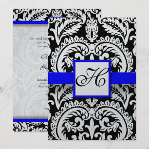 Damasco negro con invitaciones a la boda azul real