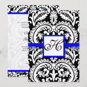 Damasco negro con invitaciones a la boda azul real