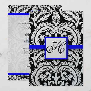 Damasco negro con invitaciones a la boda azul real