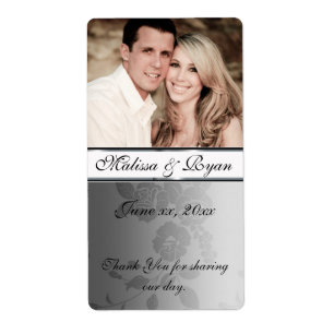 Damasco plateado con etiqueta de vino boda