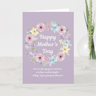 Dando a las flores la tarjeta del día de la madre